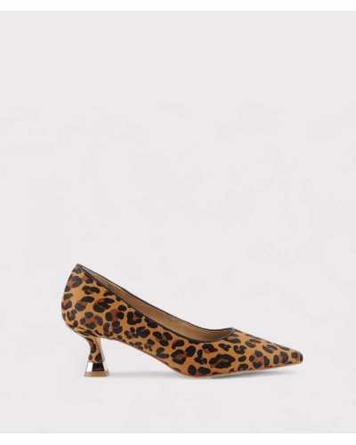 Alma en Pena salón leopardo mujer vista lateral