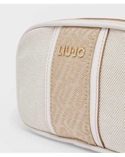 Detalle panel jacquard dorado con logo Liu Jo en relieve