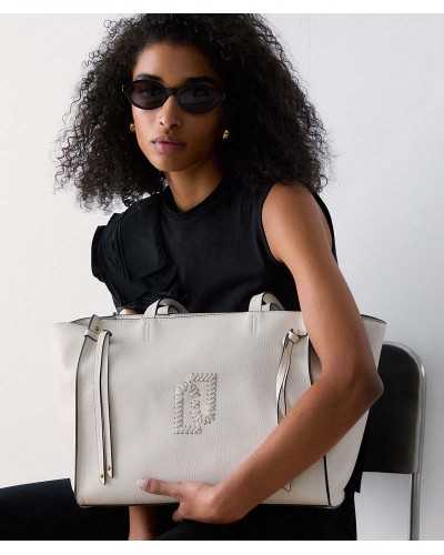 Model carrying Liu Jo white large tote bag Lapislazzu line embroidered logo