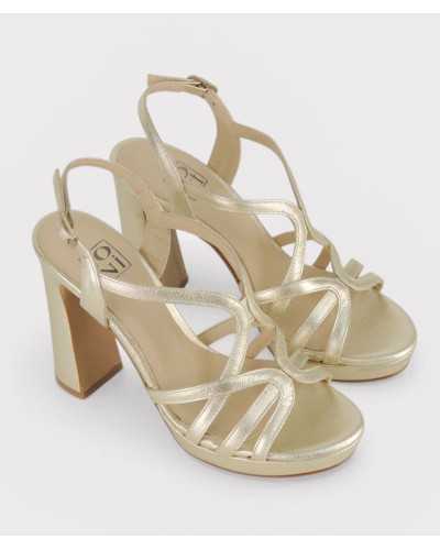 Joni gold metallic leather platform sandal block heel pair three quarter view