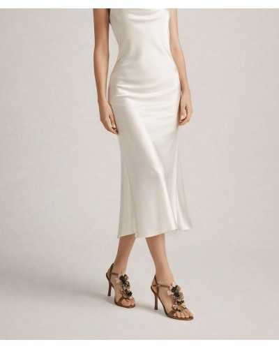 Joni bronze metallic heeled sandal worn model white satin dress handmade leather flowers