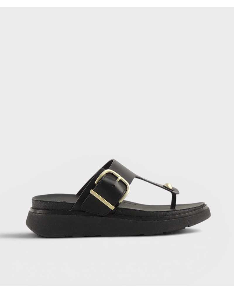 Sandalia de dedo FitFlop Gen-FF Buckle negra piel vista lateral